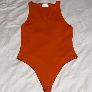 Babaton rust orange thong high neck bodysuit